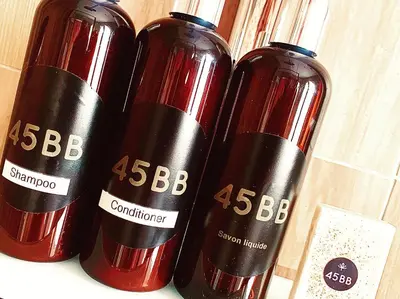 three bottles of red wine sitting next to each other at 45BB Apartment in Carcassonne