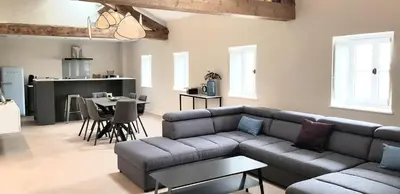 a view of a bedroom through a glass window at Loft Chic in Carcassonne