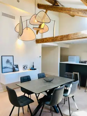 a kitchen with a sink and a stove and a refrigerator at Loft Chic in Carcassonne