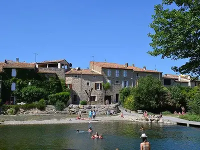 a group of people swimming in a river at Tranquil Villa with Pool in Lézignan-Corbières