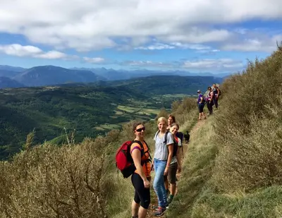 a group of people walking on a mountain trail at Appartements du Vin in Caudiès-de-Fenouillèdes