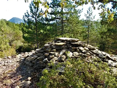 a pile of rocks on top of a hill at Maison Palmeral in Coustaussa