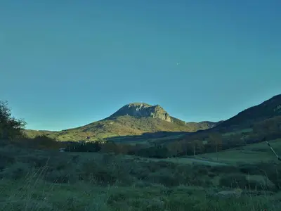 a mountain in the middle of a field at Mini-Hôtel de Camps in Camps-sur-lʼAgly
