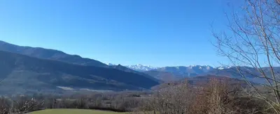 a view of a valley with mountains in the background at Gites du pech cathare in Leychert