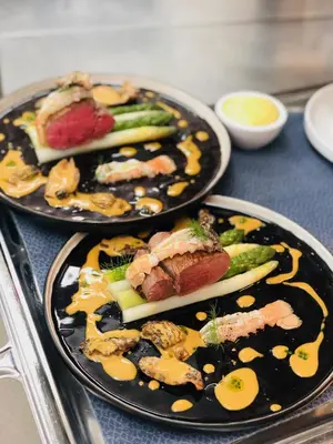 two plates of food sitting on a table at Auberge du Cellier in Montner