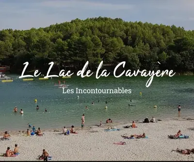 a group of people on a beach near the water at Les iris in Carcassonne