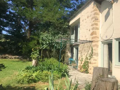 a house with a walkway leading to a door at Hameau de Montcabirol - Pyrénées in Mirepoix
