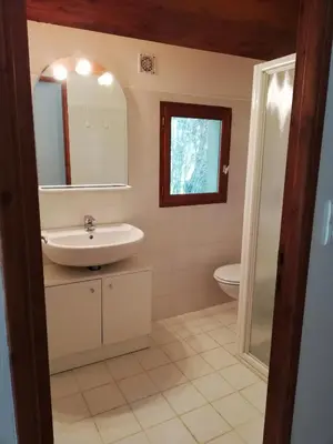 a bathroom with a sink and a toilet at Domaine des Goudis in Bouisse