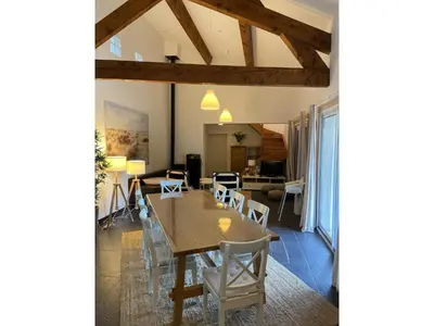 a dining room with a table and chairs at Roquebrun Villa with Pool in Roquebrun