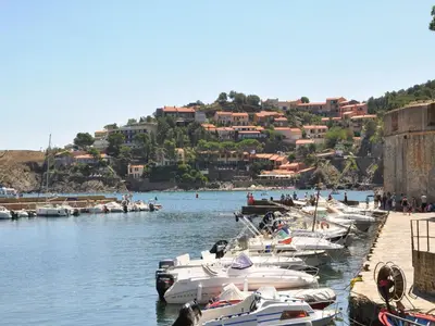 a bunch of boats are docked in a harbor at Comfortable villa with jacuzzi in Montbrun-des-Corbières