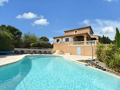 a swimming pool in front of a house at Luxe Villa in Montbrun in Montbrun-des-Corbières
