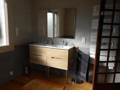 a bathroom with a sink and a mirror at La Colombe in Revel