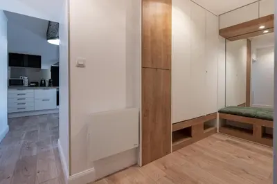 a room with a closet with a bench in it at La suite numéro 1 in Carcassonne