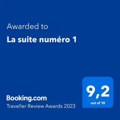 a blue phone with the text awarded to la suite number at La suite numéro 1 in Carcassonne