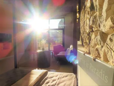 a room with the sun shining through a window at L'Accent d'ici in Le Somail