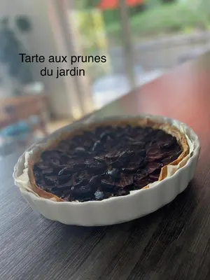 a chocolate pie in a pie pan on a table at Au Perchoir in Caunes-Minervois