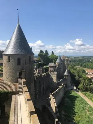 an aerial view of a castle with turrets at Le Cœur de la Bastide - Adult only in Carcassonne