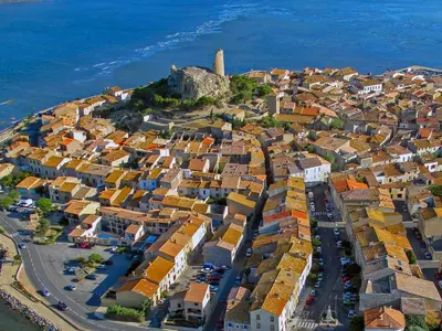 an aerial view of a town on the ocean at Holiday Home La Maison de l'Etang by Interhome in Gruissan