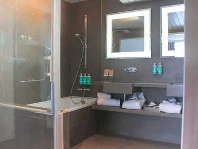 a room with a bed at Novotel Narbonne Sud A9/A61 in Narbonne
