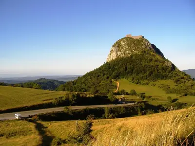 a mountain with a castle on top of it at Stay, Saint-André-de-Roquelongue in Saint-André-de-Roquelongue