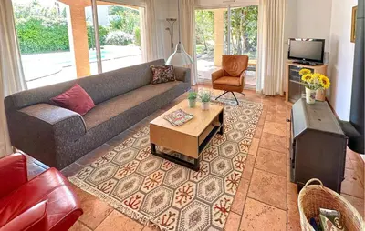 a living room with a couch and a coffee table at Stunning Home In Prades Sur Vernazobre in Prades-sur-Vernazobre