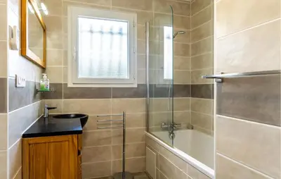 a bathroom with a sink and a shower at Amazing Home In Prades Sur Vernazobre in Prades-sur-Vernazobre