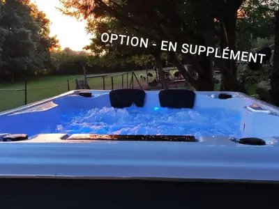 a car covered in snow with the words option end supplement at Le Wigwam du Fassac in Saint-Julien-du-Puy
