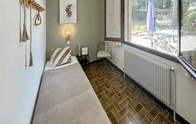 a bedroom with a bed in a room with a window at Nice Home In Cesseras With Wifi in Cesseras