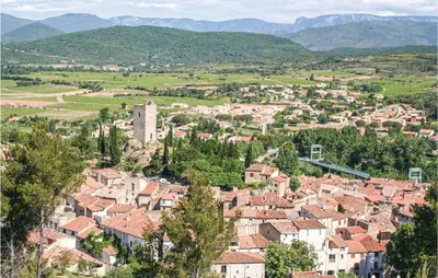 a town with houses and mountains in the background at Gorgeous Home In Cessenon Sur Orb in Cessenon