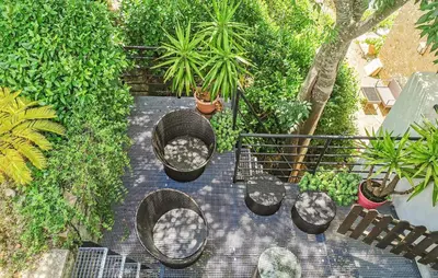 a garden in the middle of a building at 5 Bedroom Nice Home In Azillanet in Azillanet