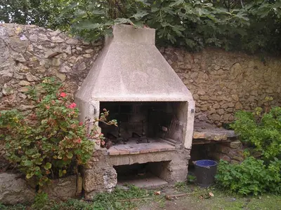 a stone oven with animals sitting on it at GITE MAMIE LAURENCE in Gruissan