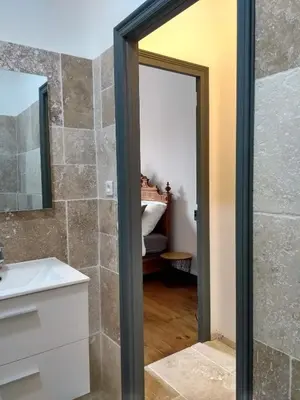 a bathroom with a sink and a mirror at Number15 Guesthouse Carcassonne in Carcassonne