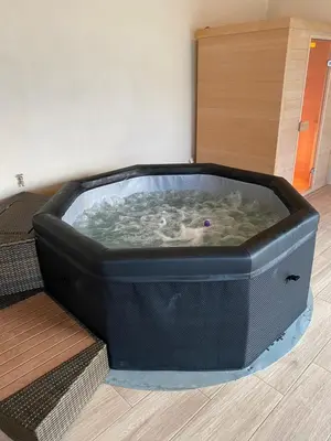 a large hot tub in the middle of a room at VILLA PINTOURINA in Sallèles-dʼAude
