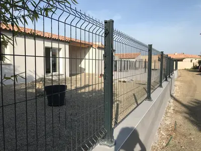 a fence in front of a house at VILLA PINTOURINA in Sallèles-dʼAude