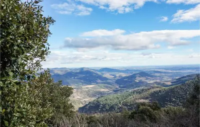 a view of a valley from the top of a mountain at 2 Bedroom Amazing Home In Olargues in Olargues