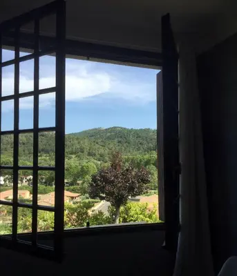 a window with a view of a mountain view at Chez Montiz in Montazels