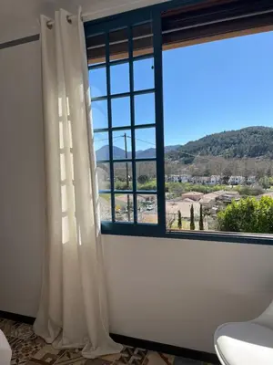 a window with a view of a city at Chez Montiz in Montazels