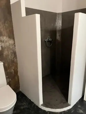 a bathroom with a shower with a toilet in it at La maison d' Elizabeth in Lagrasse