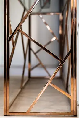 a close up of a wooden stand with a mirror at La terrasse de La Tour Pinte. in Carcassonne