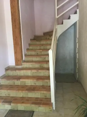 a set of stairs in a house with a stair case at le verso in Narbonne