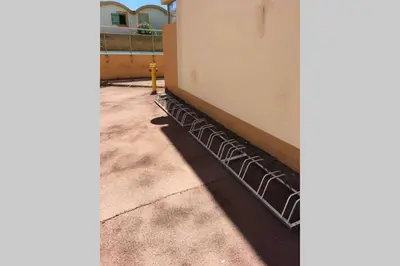 a row of metal railing on the side of a building at Location Nuit Studio Port Gruissan in Gruissan
