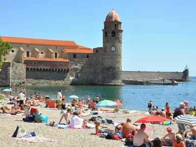 a crowd of people on a beach near the water at Classy Apartment in Villesèque-des-Corbières with Swimming Pool in Villesèque-des-Corbières