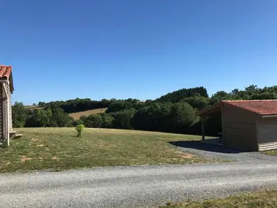 a small building on the side of a road at LES CHALETS D HERMINE in Montredon-Labessonnié