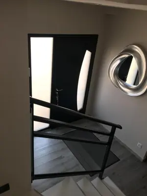 a mirror in the corner of a room at Fun and sun room in Salles-d'Aude