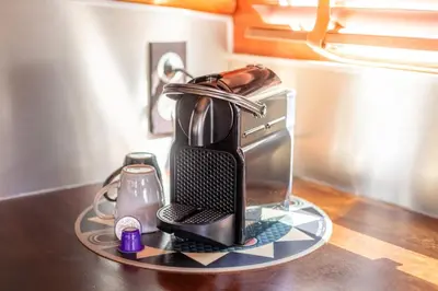 a coffee maker sitting on a counter top at Bateau Le Nubian in Narbonne