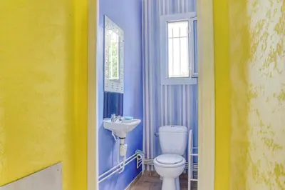 a bathroom with a toilet and a sink at Les Vignes de Carcassonne - Classé 4 étoiles Piscine et clim in Capendu