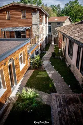 an overhead view of an alley between two buildings at Logis Hotel Nature Cathare in Léran
