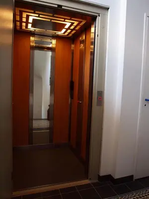 a door with a mirror in a room at Gites de l'écluse 
