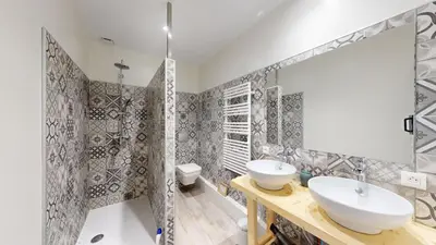 a bathroom with a sink and a shower at Les Terrisses - Chambres d'hôtes avec piscine in Saint-Félix-Lauragais