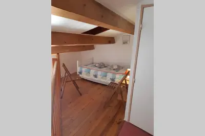 a room with a bed and a bunk bed at Pavillon Grazel GRUISSAN in Gruissan